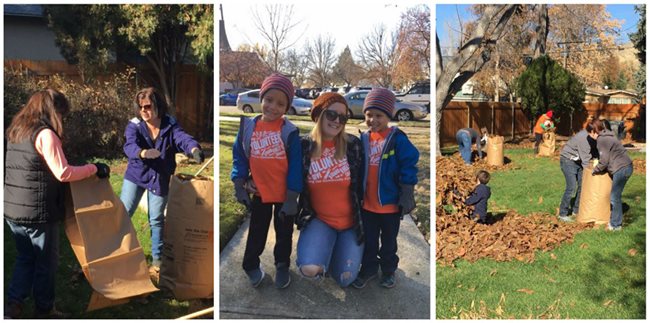 Volunteers, both adults and children, raking up leaves