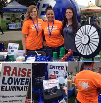 Three Pioneer employees working a booth at a community event