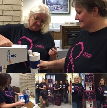 Caldwell branch employees pouring and drinking coffee they won for free