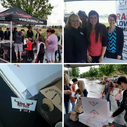 Event with donuts hosted by 101.9 FM, with happy people eating donuts