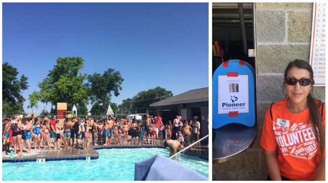 A crowd of people having fun at a pool