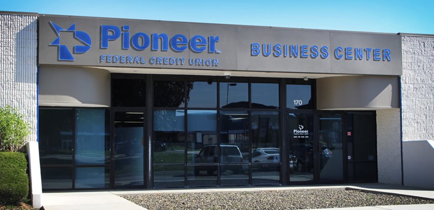 Office building with Pioneer logo and glass entryway