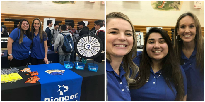 Pioneer employees at a booth at a career fair