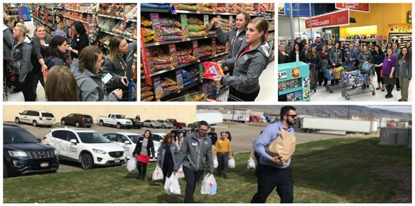 Pioneer volunteers buying food at Walmart and then walking to the food bank to donate it