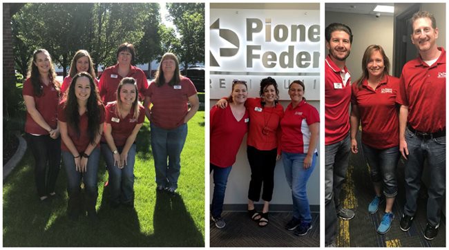 Pioneer employees all wearing red in support of the troops