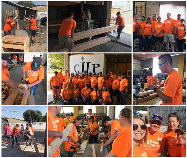 Pioneer employees in orange shirts building bunk beds