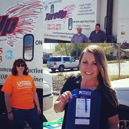 Pioneer employees in front of a paper shredder truck