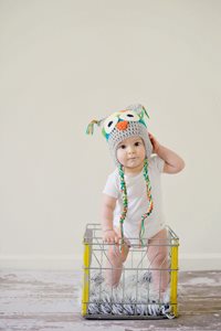 baby wearing an own knit hat