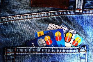 4 credit cards in a pocket