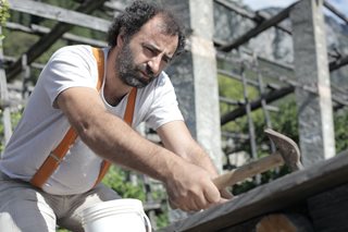 man using a hammer
