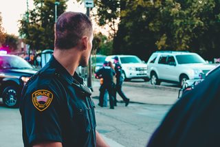 police officer standing in a street
