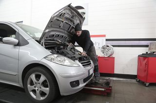 man working on a van