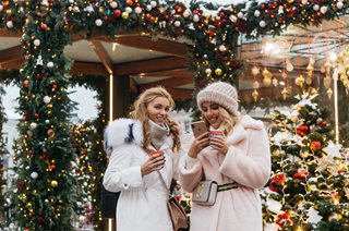 two women out shopping in christmas time