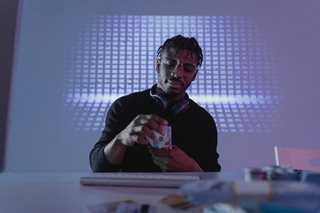 man holding a bunch of cash