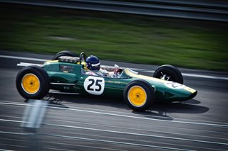 man driving a race car