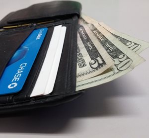 Man's wallet with cash
