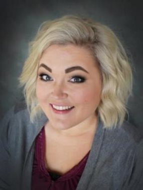 woman with blonde hair smiling