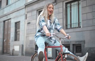 teenage girl riding a bike