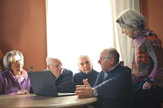 five old people talking