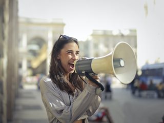woman using a megaphone