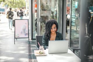 woman on laptop outside