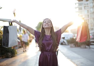 young woman holding a shopping bags