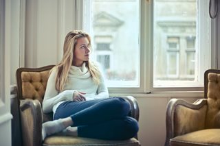 woman sitting in home