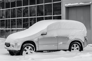 van covered in snow