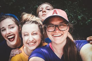teenagers smiling for a picture