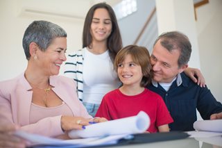 family looking at paperwork