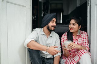 man and woman talking