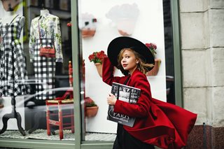 woman with red coat and hat