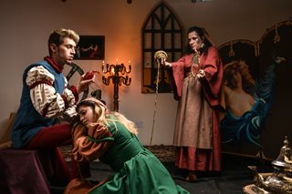 three people acting in a play