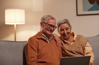 grandparents looking at a laptop