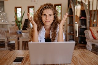frustrated woman with laptop