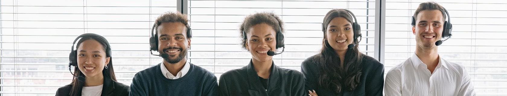 group of workers wearing headsets